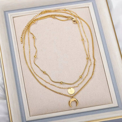 18k Yellow Gold Triple Layered Star and Moon Necklace Choker JettsJewelers
